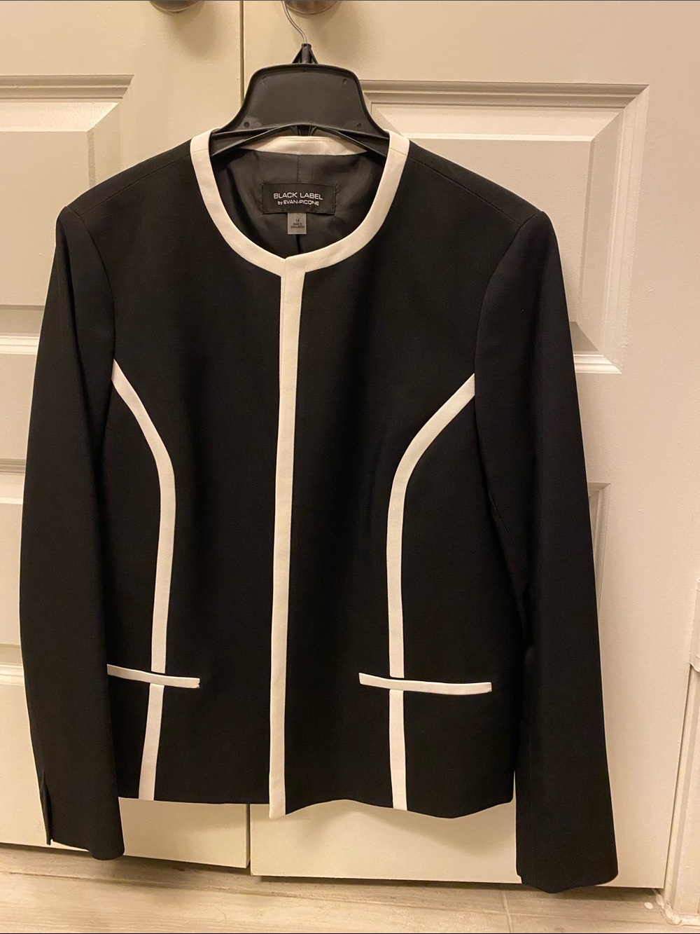 Black Jacket with White Trim/Borders